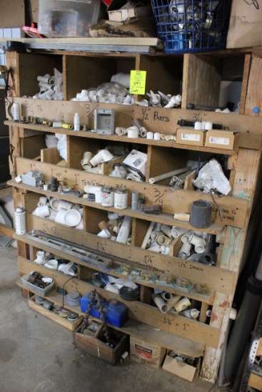 Wooden Storage Unit W/ Plumbing Parts