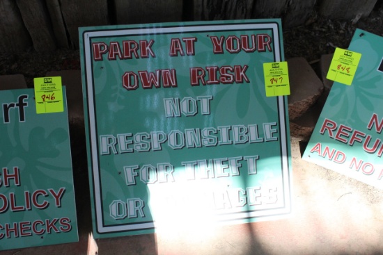 Park At Own Risk Sign