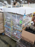 pallet of seed displays filled with seeds