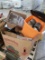 crate of stainless soup pots, Carlisle plastic containers, aluminum cake pans, etc