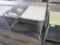 half stainless/half polytop table w/ backsplash, on casters