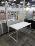 polytop table w/ backsplash, & boat rack above