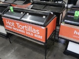 Arctic Star tortilla merchandisers, some plastic is missing, on wire shelving units