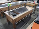 wooden table w/radient heat above: tortilla merchandiser