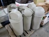 pallet of torpedo trash cans