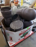 crate of assorted trash cans