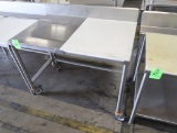 half stainless/half polytop table w/ backsplash, on casters