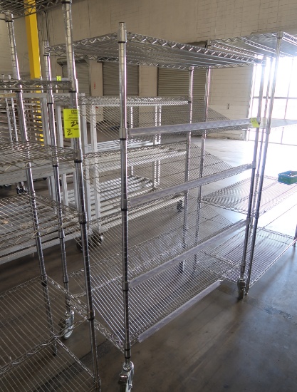 wire shelving unit w/ slanted shelves, on casters