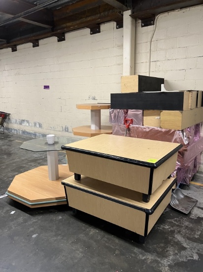 Group of assorted step ups and merchandisers