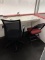 Chairs in score keeping area