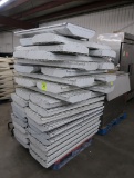 pallet of fluorescent light fixtures