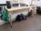 wooden table w/ steel legs, on casters