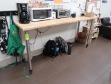 wooden table w/ steel legs, on casters