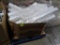 crate of rolls of plastic