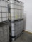 plastic containers in steel cages
