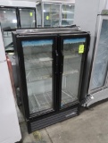 True 2) glass door refrigerated merchandiser