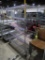 wire shelving unit w/ angled shelves, on casters