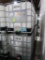 plastic containers in steel cages
