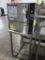 Groen steamer, on stand