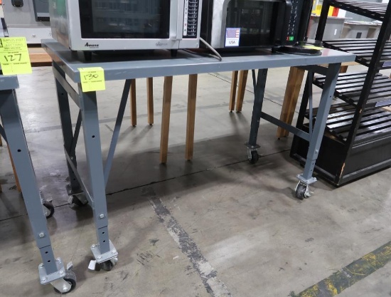 steel table, on casters