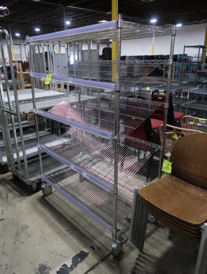 wire shelving unit w/ angled shelves, on casters