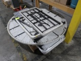 pallet of plastic-topped folding tables