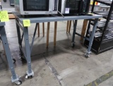 steel table, on casters