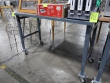 steel table, on casters