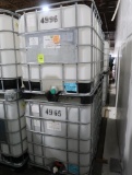 plastic containers in steel cages