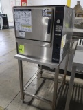 Groen steamer, on stand