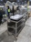 stainless/poly table w/ backsplash & 2) undershelves, on casters