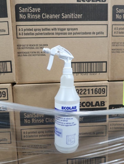 pallet of new Ecolab plastic spray bottles