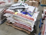 pallet of mostly red mulch, w/ 1) black mulch, 2) potting soil