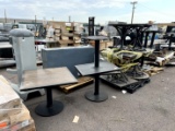 Large group of assorted café tables