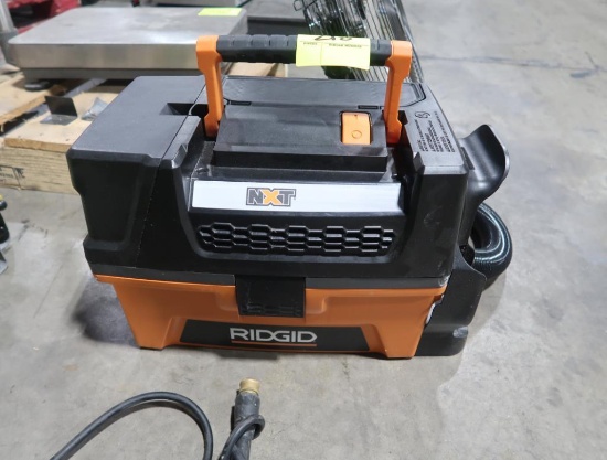Rigid portable vacuum