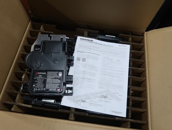 boxes of Enphase IQ8 Series microinverters for solar panels