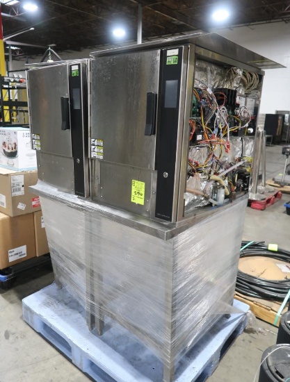 Groen boilerless steamers, on stands