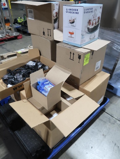 pallet of new cake display dishes, disposable razors, outdoor lights