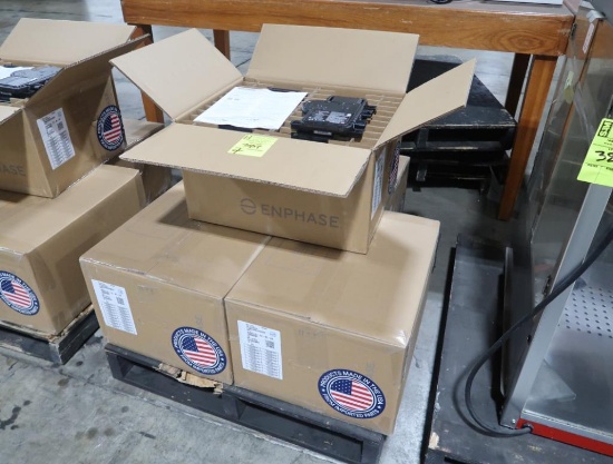 boxes of Enphase IQ8 Series microinverters for solar panels