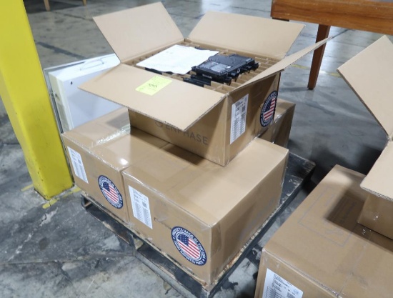 boxes of Enphase IQ8 Series microinverters for solar panels