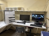 WALL SHELVING AND MILLWORK DESK IN OFFICE