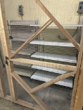 WALL SHELVING INSIDE OF CAGED AREA