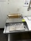 HEAT SEAL WRAPPING STATION