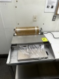 HEAT SEAL WRAPPING STATION