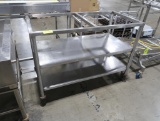 Stainless table w/ two undershelves & backsplash