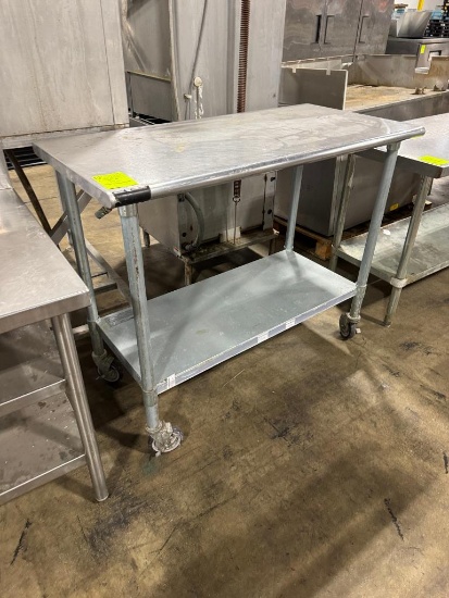 Stainless steel table w/ casters and undershelf