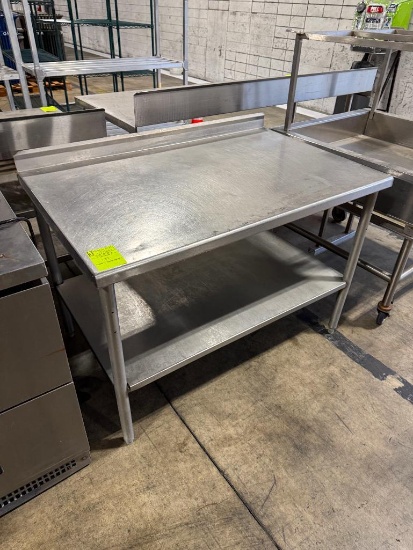 Stainless steel table w/ backsplash