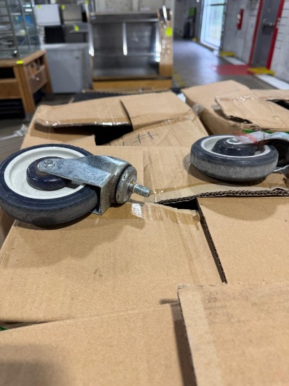 Pallet of shopping cart wheels