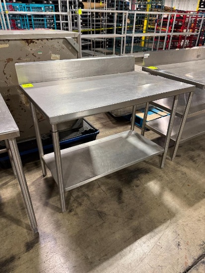 Stainless steel table w/ undershelf and backsplash