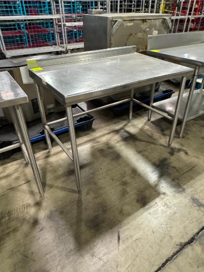 Stainless steel table w/ backsplash